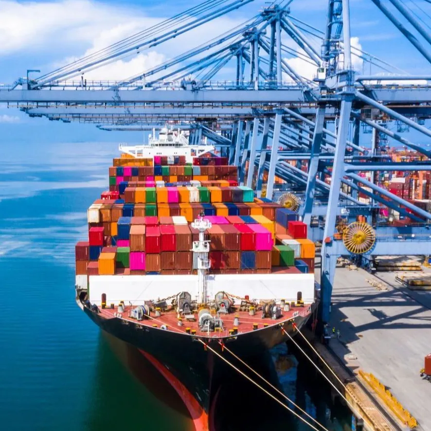 Blue STS cranes at a commercial port in China at a ship; Adobe Stock 305656856